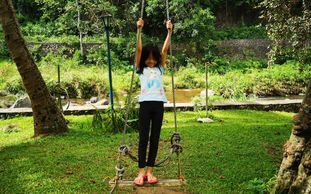 child on swing