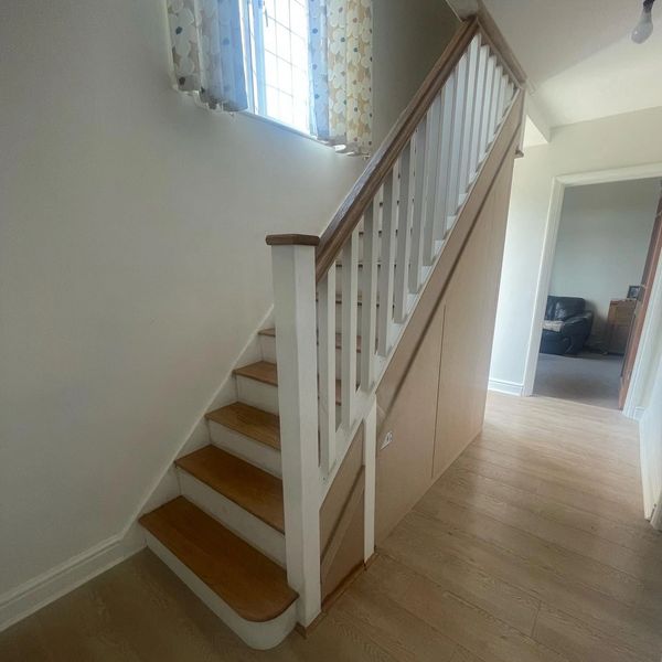 White and Oak staircase renovation with under stair storage in Hemel Hempstead, Hertfordshire.