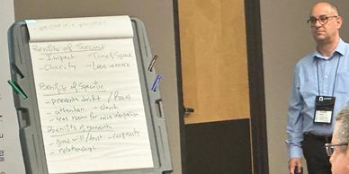 Yousif summarizing the breakout discussion