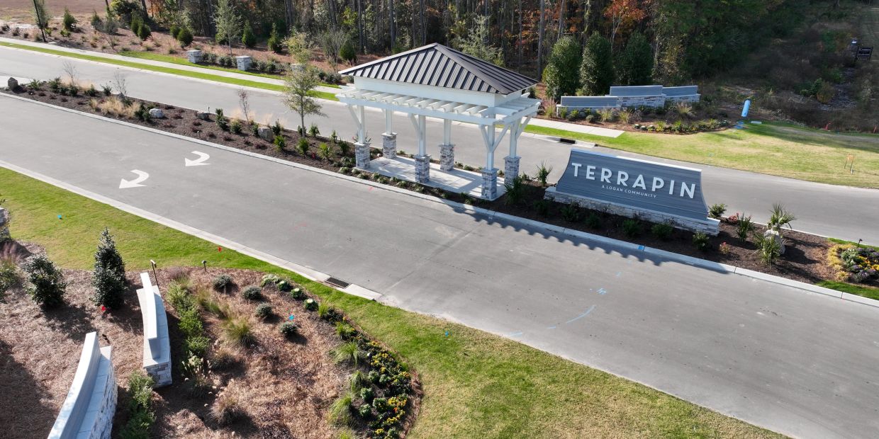 Entrance to Terrapin community with a small pavilion and landscaped garden.