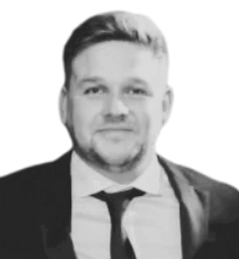 Black and white portrait of a man in a suit and tie.