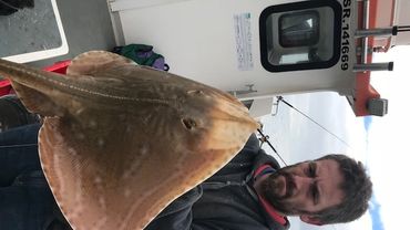 a customer onboard seawatch with a ray