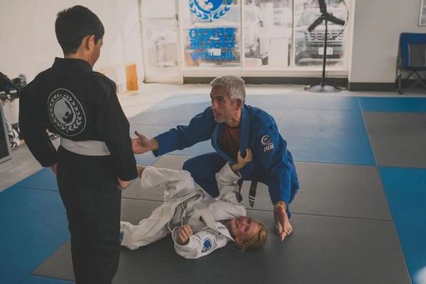 Prof. Chris Boyle instructing during our Kids Evening Gi Class