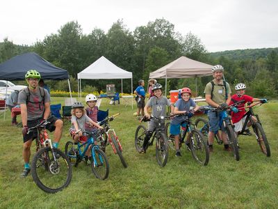 group of kids and adults on bikes