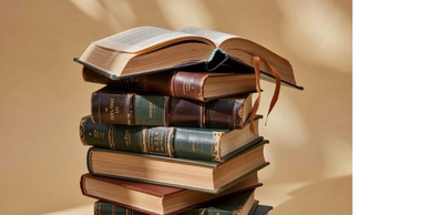 A pile of books with the Terms and Conditions for Copthorne Therapies.