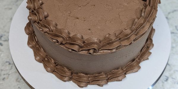 8" gluten free chocolate cake with border North Richland Hills TX