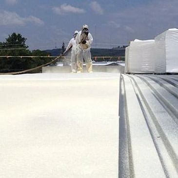 Commercial roof foam on metal roof