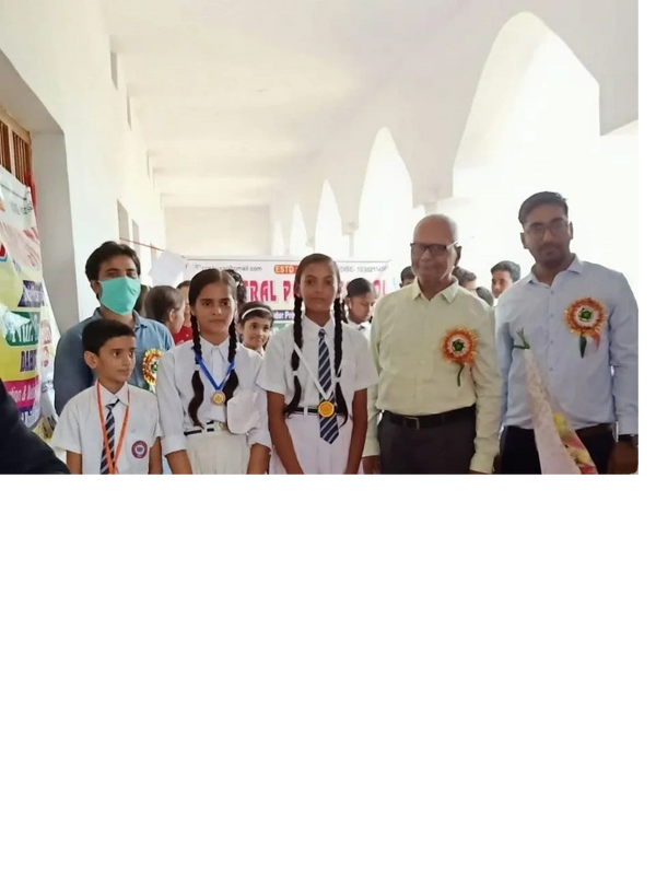 Top three students of an intra debate competition getting facilitated by honorable Chief guest and J