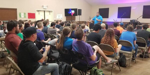 Pastor teaching during youth camp