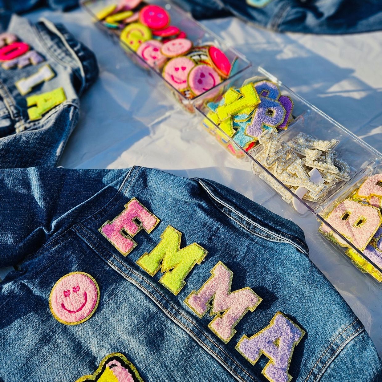 Denim jacket with chenille patches