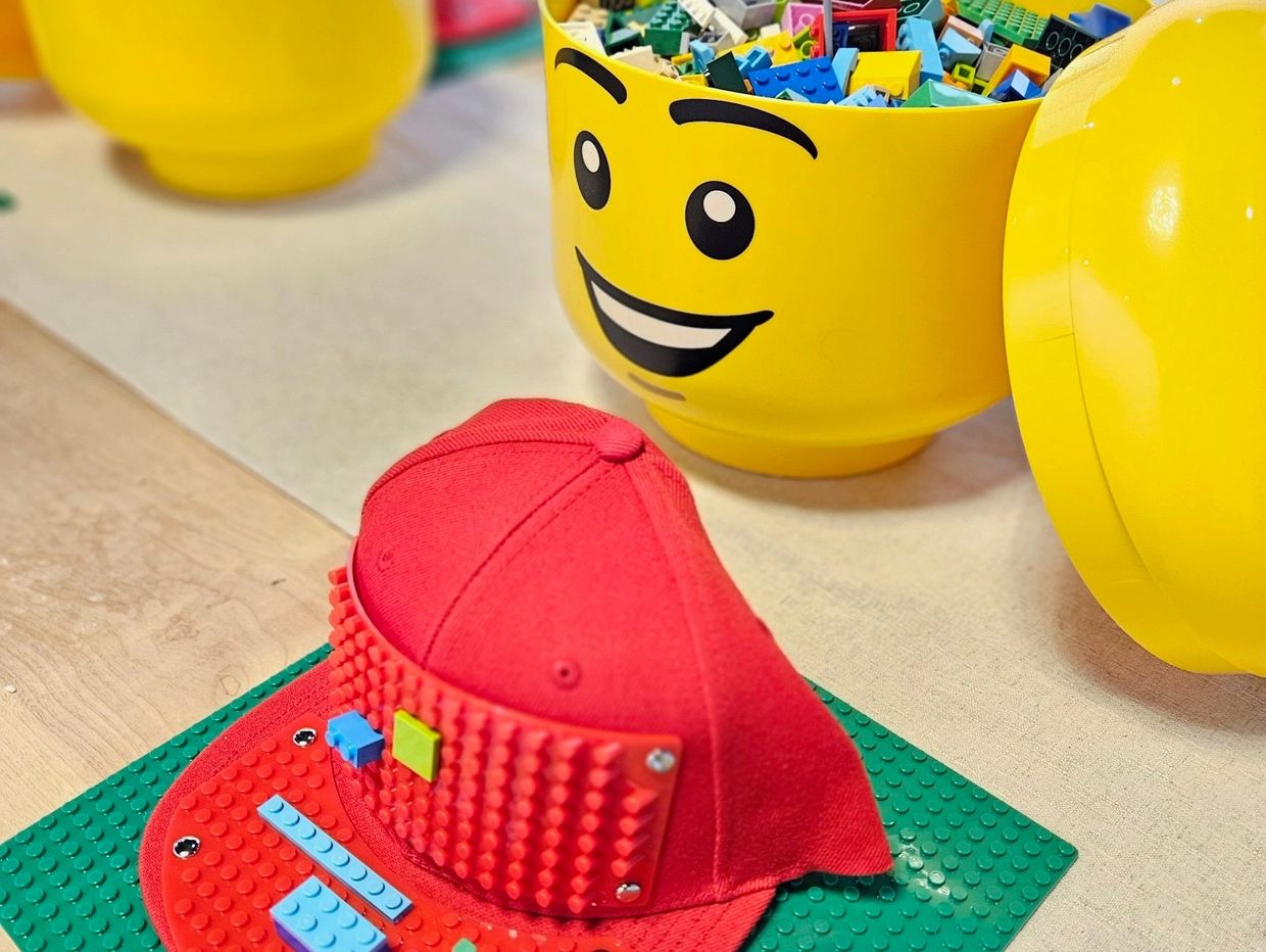 Build with legos on a hat party favor