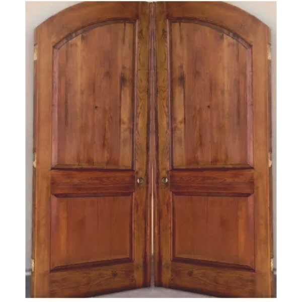 A distressed finish has been applied to an old set of solid core doors.