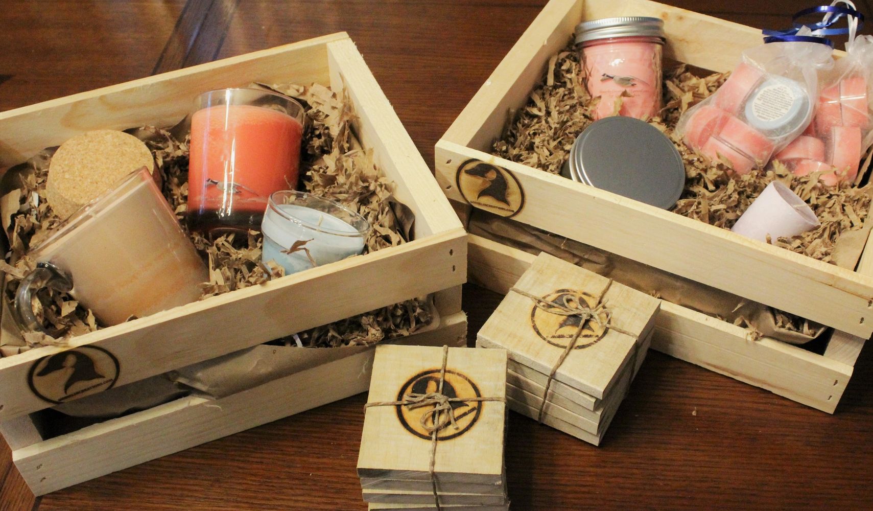 Collection of handmade soy candle products and coasters. Made in USA. Made in Maine.