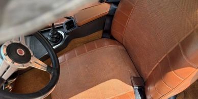 Refurnished tan (autumn leaf) interior, new seat cushions, new carpet and trim, new door panels and 