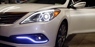 We can add custom front lighting in a variety of colors to  any car.