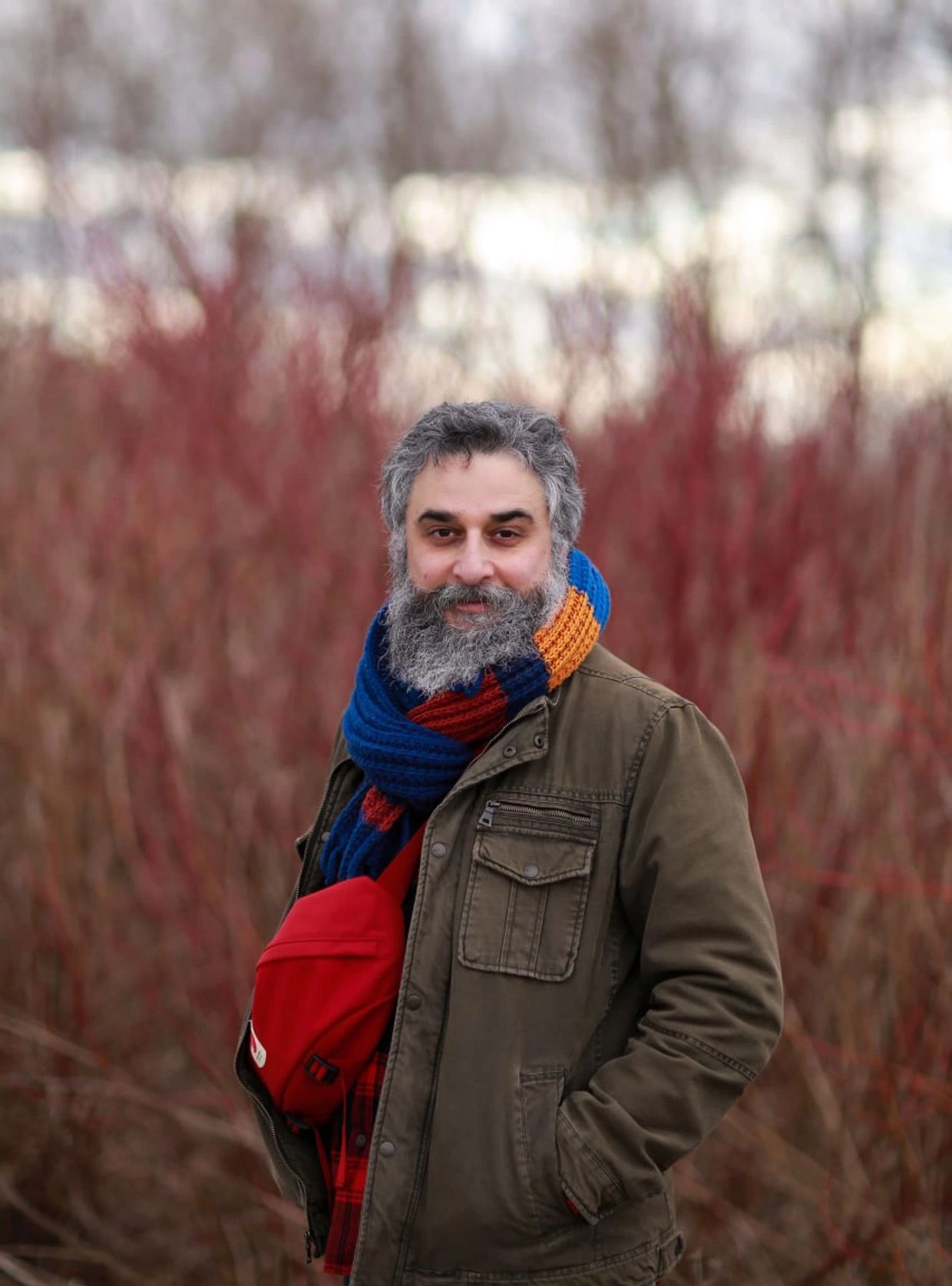 Soroush Dabiri Early wintiner in Tommy Thompson Park. Standing in front of trees. Photo by: Andishe
