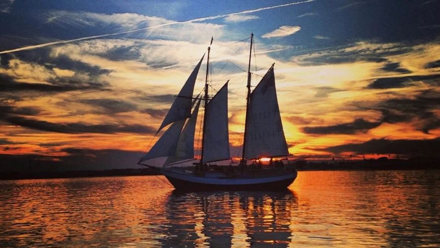 Sailing boat in the sunset. Age in Place with S.A.I.L to live well. 