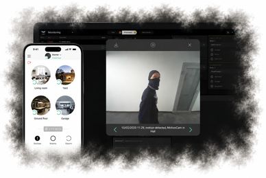 Home security app detects intruder captured by motion camera in the hall.