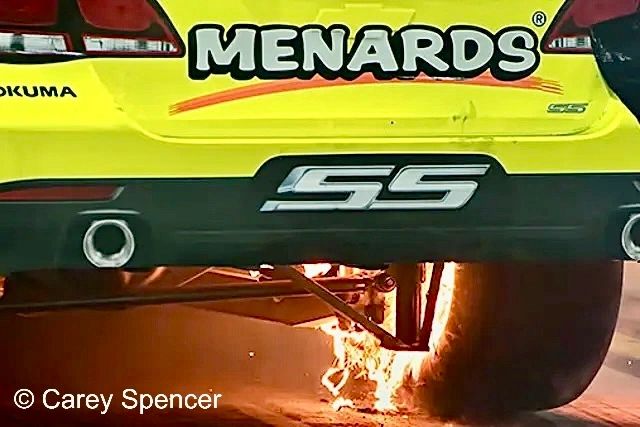 Menard's fiery NASCAR pit fire Homestead Miami  starts around the car's right rear tire.  
