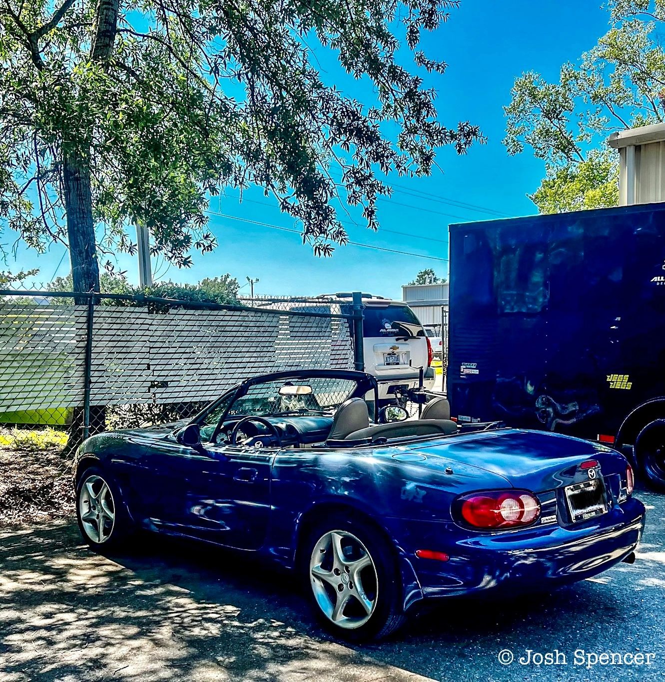 Parked Blue Mazda MX-5 Miata NB 