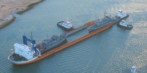 Stellar Transport Ltd. managing tug unloading of two minesweeping vessels for the Greek Navy.