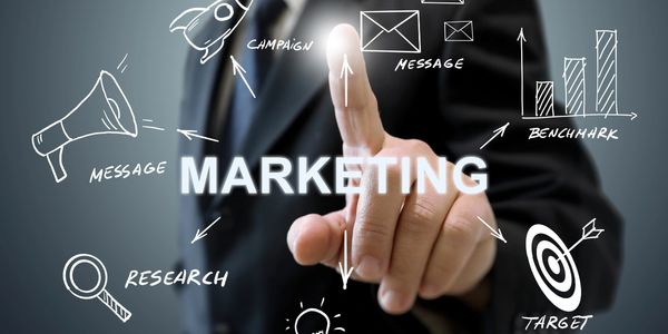 Businessman interacting with marketing strategy concepts on a virtual screen.