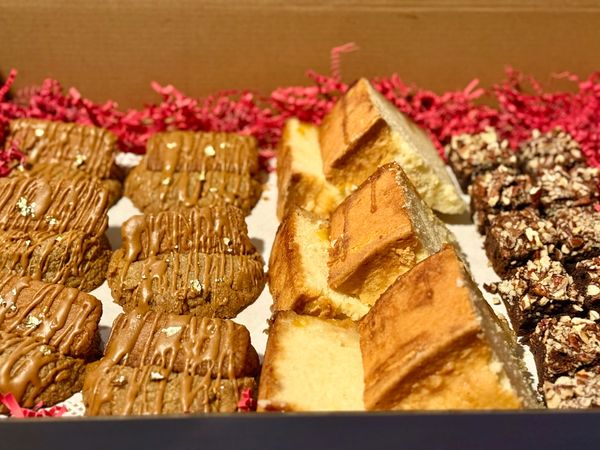 Party platter which includes six gourmet cookies, six slices of decadent  pound cake and delicious m