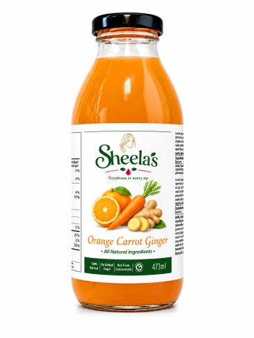Sheela's Orange Carrot Ginger juice in a glass bottle with natural ingredients.