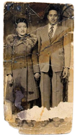 Vintage photo of a couple in formal attire.