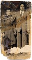 Vintage photo of a man and woman standing together.