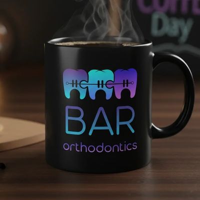Coffee Mug with Bar Orthodontics logo on it.