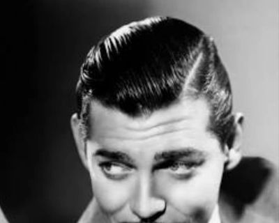 A vintage photo of a man with a precision haircut
