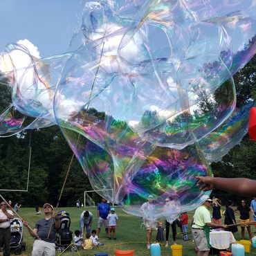 See and pop giant bubbles -- and make giant bubbles at every Bubble Festival with Grandpop Bubbles.
