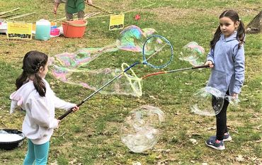 Grandpop Bubbles makes wands, tristrings, & bubble juice for everyone to enjoy making giant bubbles
