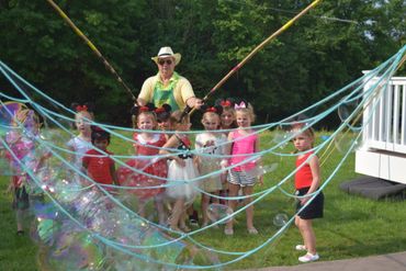 Grandpop Bubbles has fun at birthday parties. Kids make the BIGGEST soap bubbles of their lives.