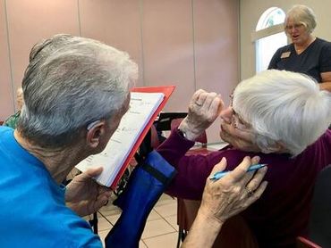 2 people discussing the music