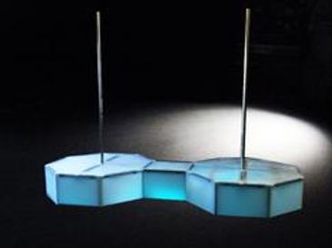 "Double Trouble" illuminated pole stage platform.