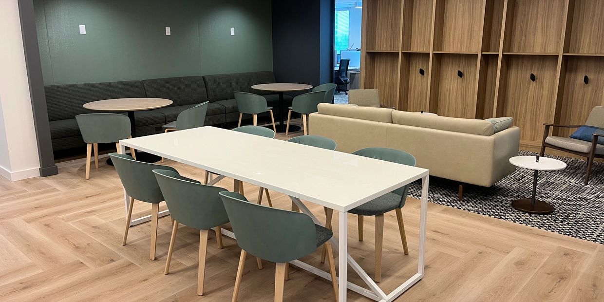 "Modern break room furniture designed for comfort and functionality, including ergonomic chairs, sleek tables, cozy sofas, and versatile storage solutions to create a relaxing and collaborative space."