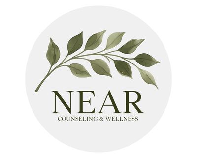 Logo with green leaves and text 'NEAR Counseling &amp; Wellness'.
