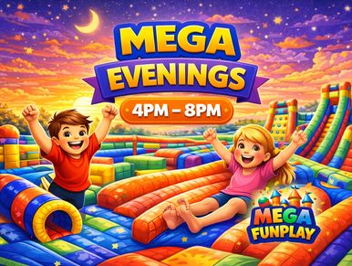 Children playing joyfully in a colorful inflatable playground during a sunset.