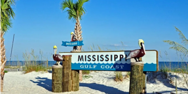 Welcome sign at Mississippi Gulf Coast beach.