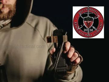 Person holding a tactical sling with a Recon 26 educational content logo.