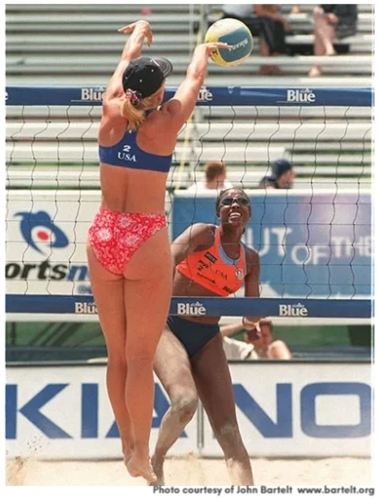 Ali blocking Annett Davis at the 1998 FIVB Toronto Open beach volleyball tournament.