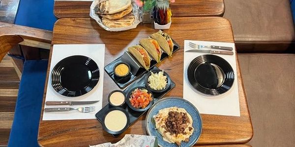 Gorgeous kosher lunch spread including kosher tacos, croquettes, and other delicious kosher items