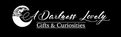 A logo for 'A Darkness Lovely' with a cat on a crescent moon.