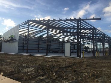 Steel skeleton frame of a large metal building.