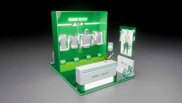 Green retail display for Adidas and Rueda collaboration.