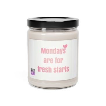 A candle jar with the label 'Mondays are for fresh starts' in soft pink.