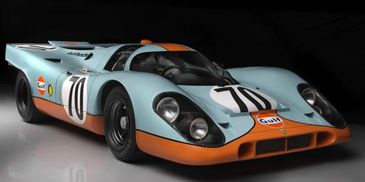 Classic Gulf-livery Porsche race car with number 70 on hood and sides.