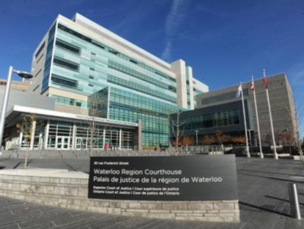 Modern courthouse building with glass facade in Waterloo.